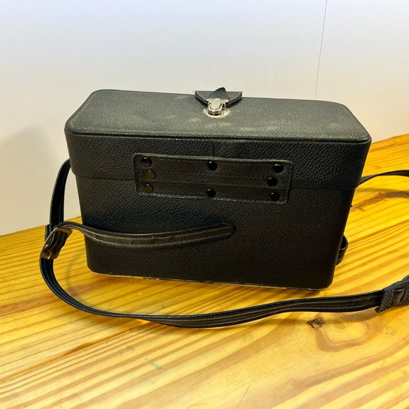 Yashica Black and Silver Film Camera with Rangefinder Design - Picture 9 of 12